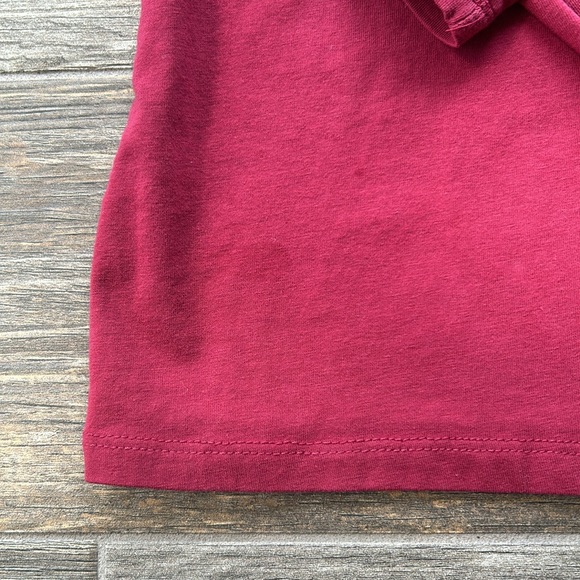 Woman’s long sleeved stretch tee. Has a small faint stain. Shown in photos. - Picture 2 of 6